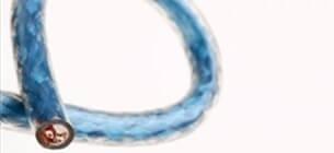 close up view of blue jacketed audio cable end on a white background