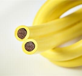 view of a bonded dual cable in yellow tubing.