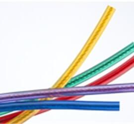 view of multiple custom audio cables in different colours.